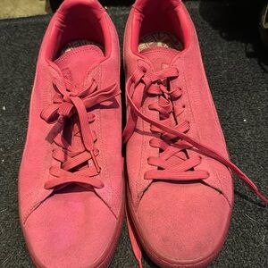 Pink suede low top puma sneakers